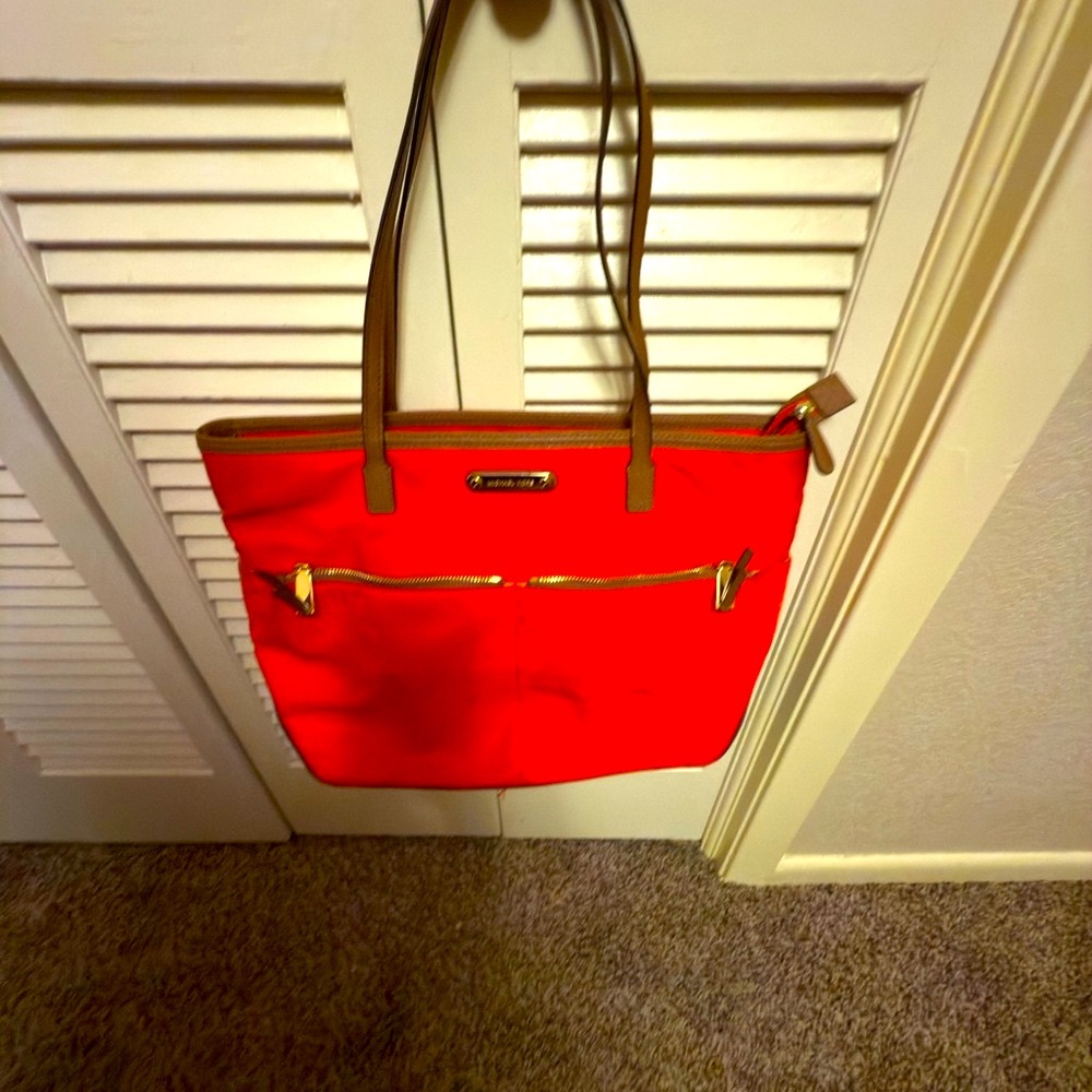 Orange and Brown Leather Totes with Structured Design